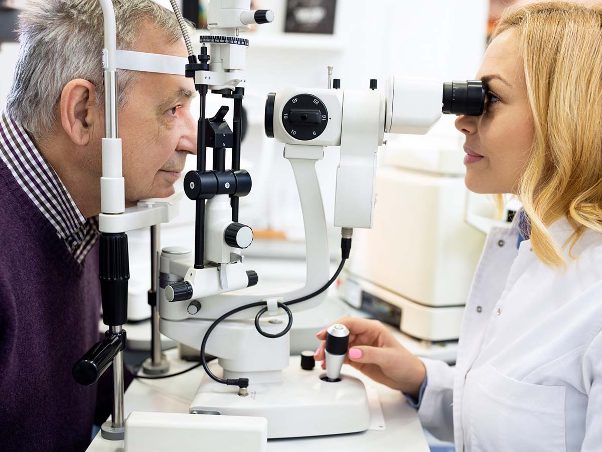 An eye doctor examining a patient
