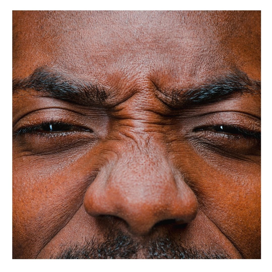 black man squinting