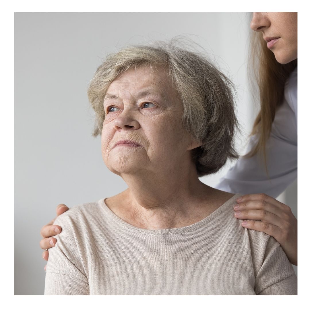 older woman looking off in the distance